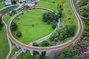 Viaduct Prints: The Bernina Express passing on the spiral viaduct in Brusio, Val Poschiavo, Switzerland