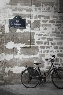 Bikes Collection: Bicycle and street sign, Paris, France