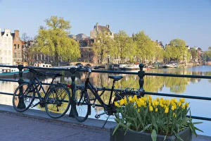 West European Prints: Bicycles on bridge, Amstel River, Amsterdam, Netherlands