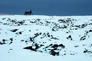 Budir Prints: Black church in snowy winter landscape, Budir, Snaefellsnes Peninsula, Iceland