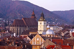 Images Dated 25th May 2012: The Black Church & Town Hall Clock Tower illuminated at dawn, Piata Sfatului, Brasov