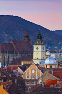 Images Dated 25th May 2012: The Black Church & Town Hall Clock Tower illuminated at dawn, Piata Sfatului, Brasov