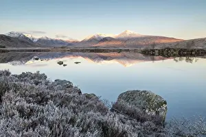 March Prints: Black Mount reflected in Lochan na h-achlaise on a frosty morning on Rannoch Moor in the Scottish Highlands