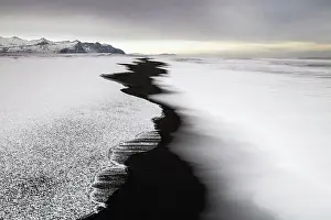 Abstract Prints: Black sand beach fringed by snow and surf, near Jokulsarlon, South Iceland