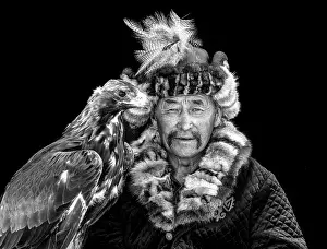 Black And White Prints: Black & white portrait of a Kazakh Eagle Hunter wearing traditional fur clothing