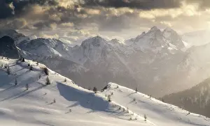 Snowing Prints: Blizzard conditions over the mountains around the Giau Pass during a spring evening