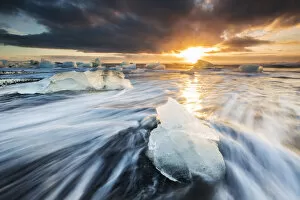 Blocks of ice at sunrise, Jokulsarlon, Diamond beach, Austurland, Iceland