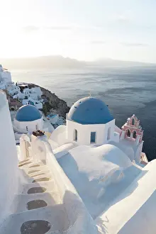Blue Domed Prints: Blue domed churches, white-washed houses and steps with caldera view in the distance
