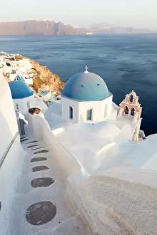 Blue Domed Prints: Blue domed churches, white-washed houses and steps with caldera view in the distance
