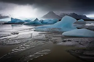 Jokulsarlon Prints: Blue icebergs and sheets of ice on the lagoon at Fjallsarlon