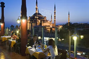Images Dated 26th February 2009: The Blue Mosque & rooftop restaurant, Sultanahmet District, Istanbul, Turkey