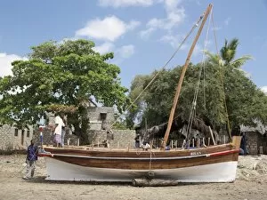 Boat builders put the finishing touches to a new jahazi