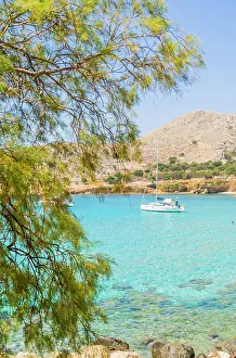 Chalki Prints: A boat at Pondamos Beach, Halki, Chalki, Dodecanese Islands, Greece