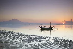 Boat on Sanur beach at dawn, Bali, Indonesia