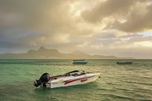 Mauritius Prints: Boats on a lagoon near Point Jerome at sunrise