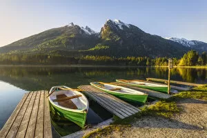 Boats at lake Hintersee against Hochkalter, Berchtesgaden Alps, Bavaria, Germany