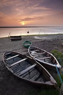Images Dated 22nd January 2015: Boats at low tide on the shore of The Fleet lagoon, Chesil Beach, Dorset, England. Spring
