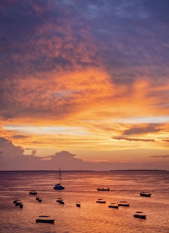 Zanzibar Prints: Boats on the sea in silhouette at sunset, Nungwi, Zanzibar, Tanzania