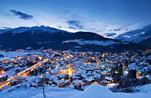 Bormio in winter at dusk, Sondrio province, Valtellina valley, Lombardy, Italy Bormio in winter at dusk, Sondrio province, Valtellina valley, Lombardy, Italy