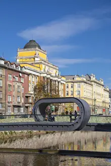 Pedestrian Bridge Prints: Bosnia and Herzegovina, Sarajevo, Buildings on the banks of the Miljacka River