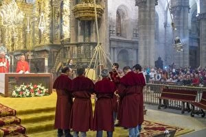 Images Dated 3rd July 2015: The Botafumeiro an incense burner being swung during service in The Cathedral, Santiago