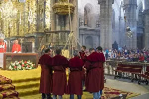 Galicia Prints: The Botafumeiro an incense burner being swung during service in The Cathedral, Santiago