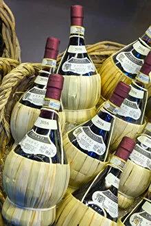Images Dated 30th August 2019: Bottles of Chianti wine for sale at Mercato di San Lorenzo, Florence (Firenze), Tuscany