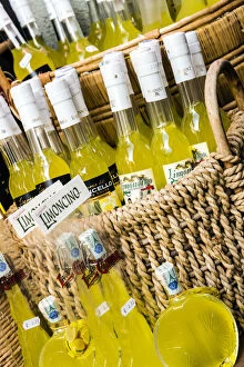 Images Dated 11th November 2015: Bottles of local limoncello lemon liqueur on sale, Limone sul Garda, Lake Garda, Lombardy