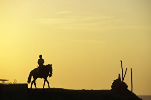 Rider Prints: A boy on horseback at the beach village of Mancora