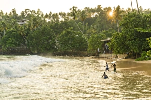 Sri Lanka Prints: Boys playing in surf, Mirrisa beach, South coast, Sri Lanka