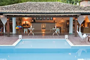 Seats Prints: Brazil, Bahia, Swimming pool Etnia pousada in Trancoso