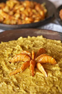 Brazil, Food, a bowl of vatapa with king prawns, a typical dish from Bahia made with