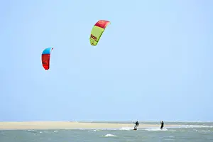 Brazil, Maranhao, Lencois Maranhenses national park, Atins, kitesurfers surfing next