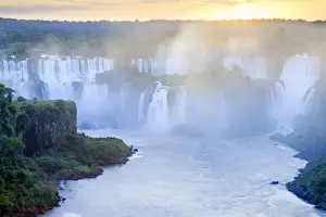 Brazil, Parana state, sunrise over the Iguacu or Iguazu falls as photographed