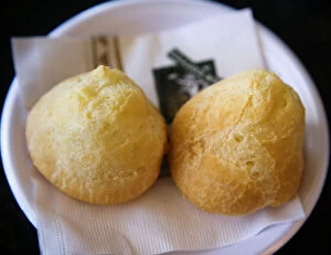 Images Dated 14th December 2010: Brazil. Traditional Food. 2 Delicious Cheese Bread Rolls, Pao de Queijo