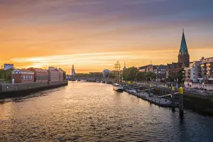State Of Bremen Prints: Bremen, Bremen State, Germany. Cityscape at sunset over the Weser river