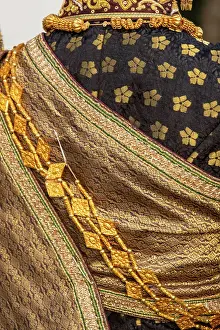 Clothing Prints: Bride wearing traditional clothes for her wedding photographs