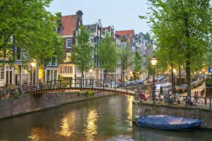 Bridge over Brouwersgracht in western Grachtengordel canal ring at dusk, Amsterdam