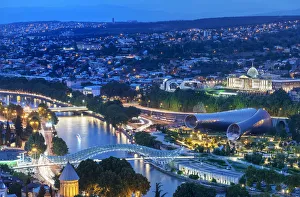 Images Dated 30th July 2018: Bridge of Peace and the Mtkvari river. On the right, the Rike Park Music Theatre