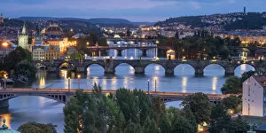 Prague Collection: Bridges over Vltava river against sky seen from Letna park at night, Prague, Bohemia