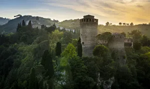 Emilia Prints: Brisighella, Ravenna, Emilia Romagna, Italy Europe. The medieval fortress at dusk