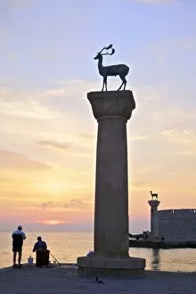 Images Dated 5th June 2015: Bronze Doe and Stag Statues At The Entrance Of Mandraki Harbour, Rhodes, Dodecanese
