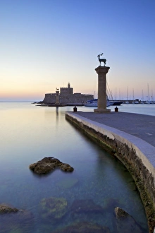 Bronze Doe and Stag Statues At The Entrance Of Mandraki Harbour, Rhodes, Dodecanese Bronze Doe and Stag Statues At The Entrance Of Mandraki Harbour, Rhodes, Dodecanese