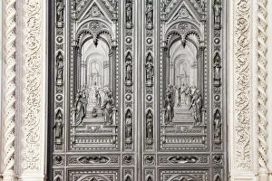 Images Dated 18th July 2018: Bronze front door of tf Saint Mary of the Flower Cathedral, Florence, Tuscany, Italy