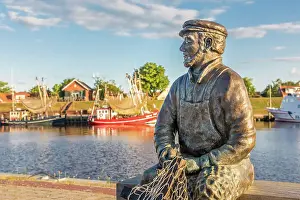 Nets Prints: Bronze statue Fisherman (artist Hans-Christian Petersen) harbor of Greetsiel