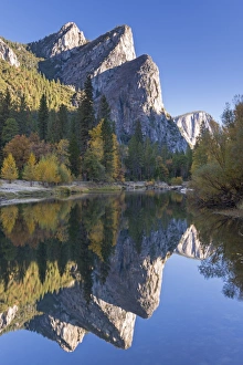 October Prints: The Three Brothers reflected in the Merced River at dawn, Yosemite Valley, California, USA