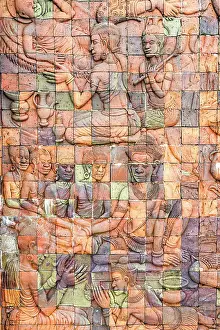 Ancient History Prints: Buddha figures and ancient past life scenes carved on tiled wall of a pagoda