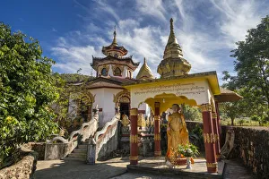 Kengtung Prints: Buddha statue at Ko Yin Lay Monastery near Kengtung, Mong La, Mong La Township