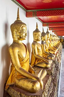 Gold Gallery: Buddha statues in Wat Pho (Temple of the Reclining Buddha), Bangkok, Thailand