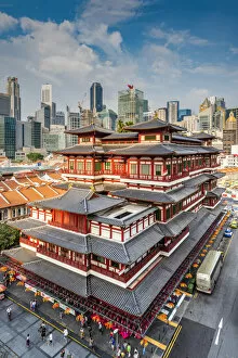 Images Dated 18th September 2018: Buddha Tooth Relic Temple and city skyline, Singapore
